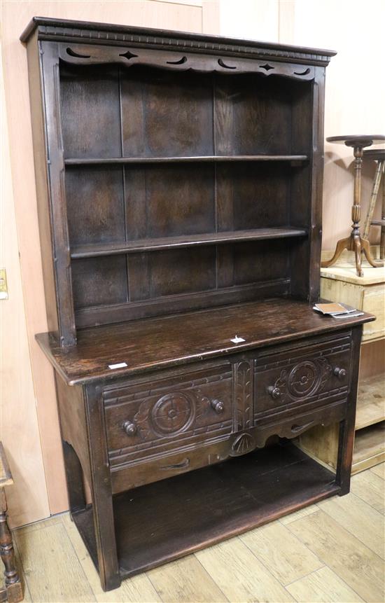 An oak dresser and rack, W.122cm